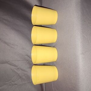 Four Tupperware Tumblers - holds 4 ounces, dull, yellow color